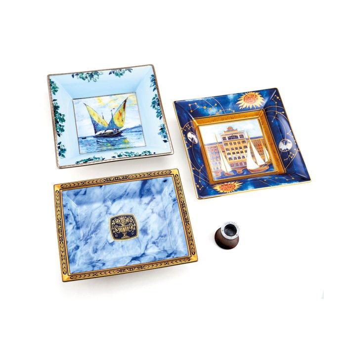 Patek Philippe A Group of Three Patek Philippe plates and loupe, With outer box