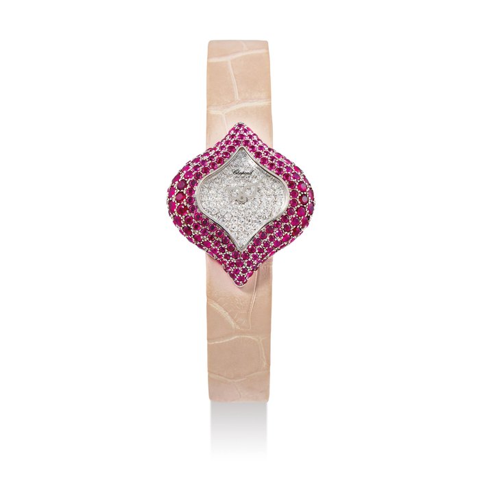 Chopard. A Lady's 18K White Gold and Diamond Ruby 'Pushkin' Wristwatch, no. 517150 With pouch