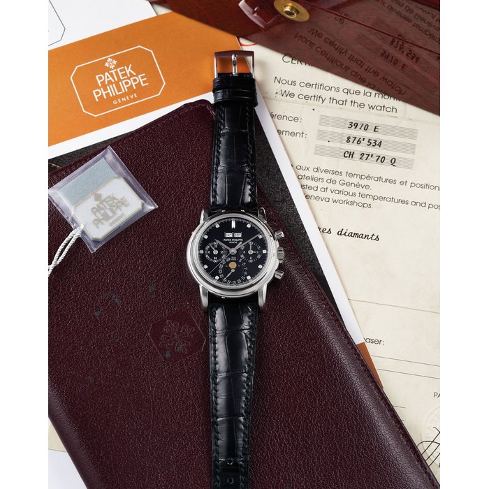 Patek Philippe. A Fine Platinum and Diamond Perpetual Calendar Wristwatch with Moonphase Ref. 3970E