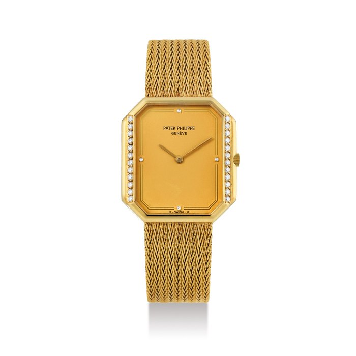Patek Philippe. A Yellow Gold and Diamond Bezel Bracelet Watch Ref. 3894/1