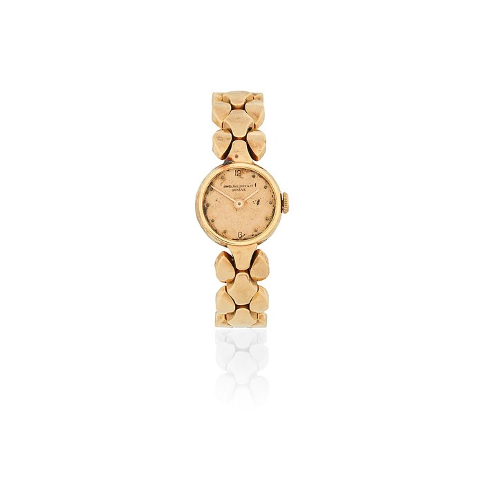 Patek Philippe. A lady's 18K rose gold manual wind cocktail bracelet watch Sold 19th February 1945
