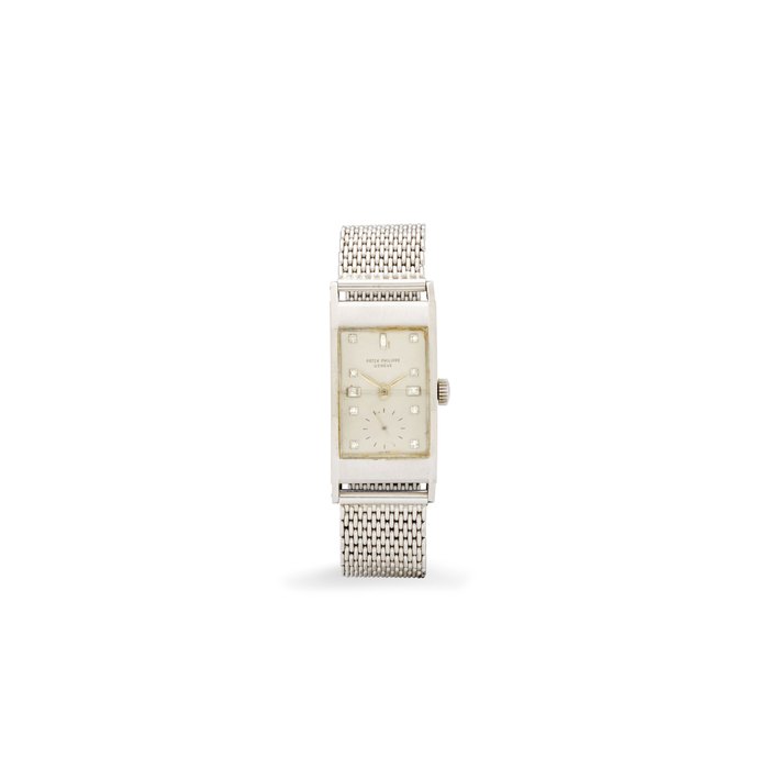 Patek Philippe Patek Philippe. A very fine platinum rectangular wristwatch with diamond numerals and a platinum mesh braceletRef: 425, 1948, Price & Market Data