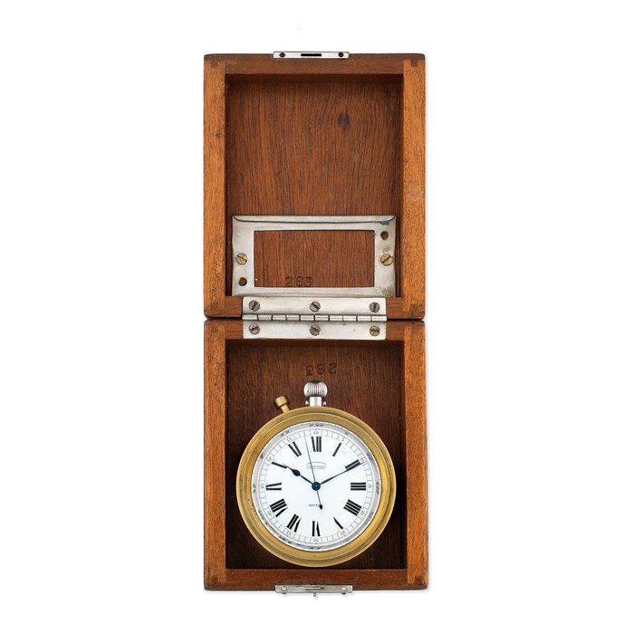 Ulysse Nardin. A stainless steel keyless wind open face Observation chronometer deck watch with wooden display box Circa 1940