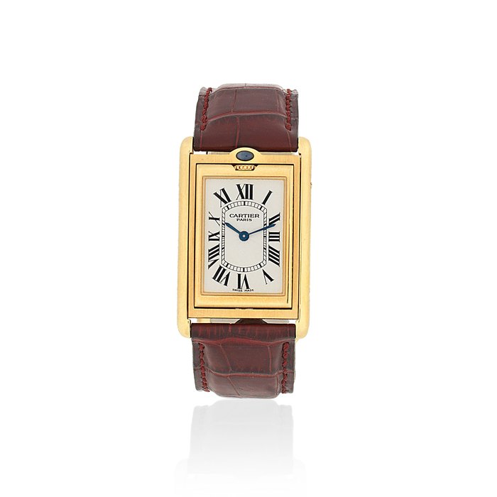 Cartier. A Limited Edition 18K gold manual wind reversible wristwatch Tank Basculante Millennium, No.015/365, Ref: 2391, Circa 2000