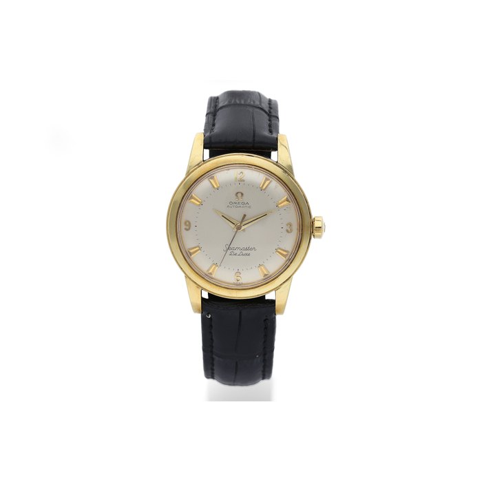 Omega. A Yellow Gold Bumper Automatic Wristwatch