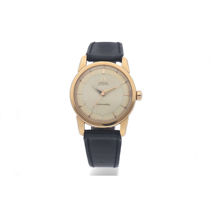 Omega. A Yellow Gold Wristwatch with Two-Tone Honeycomb Dial