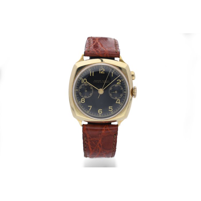 Ulysse Nardin. A Yellow Gold Cushion Form Single Button Chronograph Wristwatch with Black Dial
