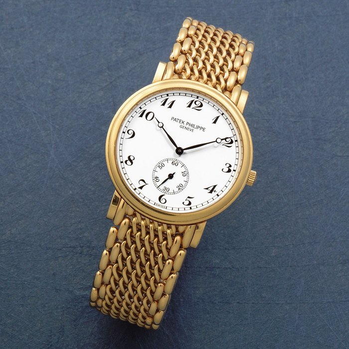Patek Philippe. A fine 18K gold manual wind bracelet watch Calatrava, Ref: 5022/1J-011, Circa 2000