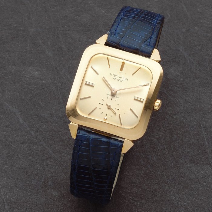 Patek Philippe. A fine 18K rose gold automatic cushion form wristwatch Retailed by Hausmann & Co. Ref: 2540, Circa 1954