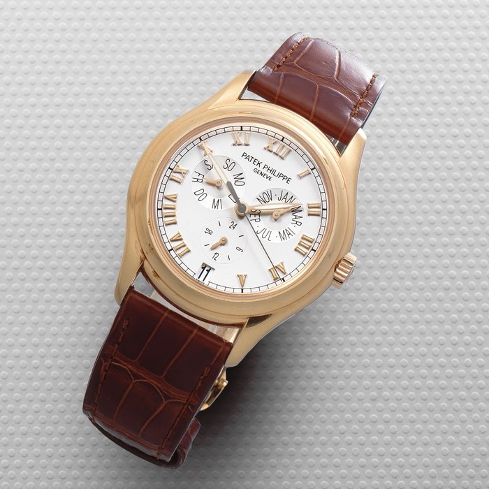 Patek Philippe. A fine 18K rose gold automatic annual calendar wristwatch with 24 hour indication Ref: 5035R, Circa 2000