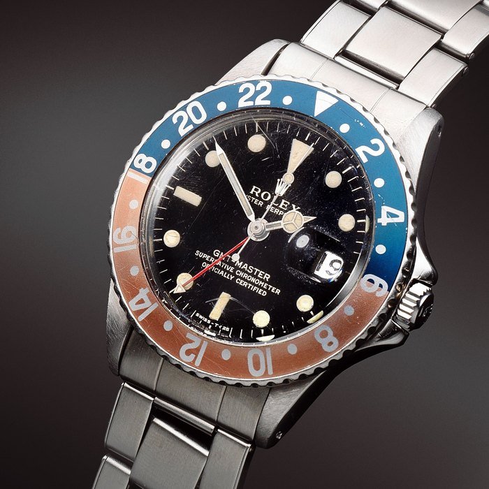 Rolex Rolex. A stainless steel automatic calendar bracelet watch with gilt glossy dial GMT Master, Ref: 1675, Sold 30th August 1966 · 1675