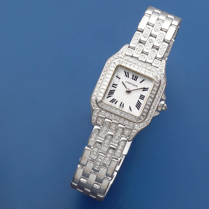 Cartier. A lady's 18K white gold and diamond set quartz cushion form bracelet watch with mother of pearl dial Panthére, Ref: 2362, Circa 2000