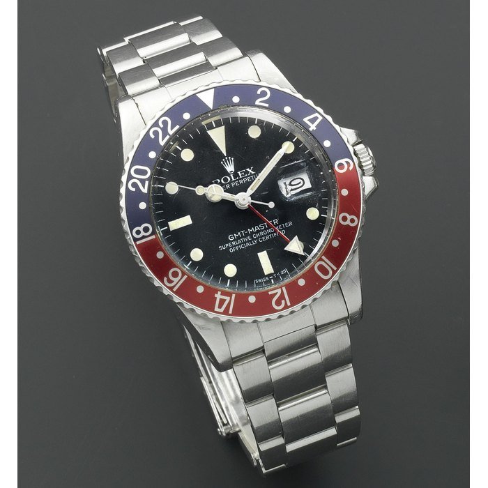 Rolex Rolex. A stainless steel automatic calendar bracelet watch with dual time zone GMT-Master, Ref: 16750, Circa 1982 · 16750