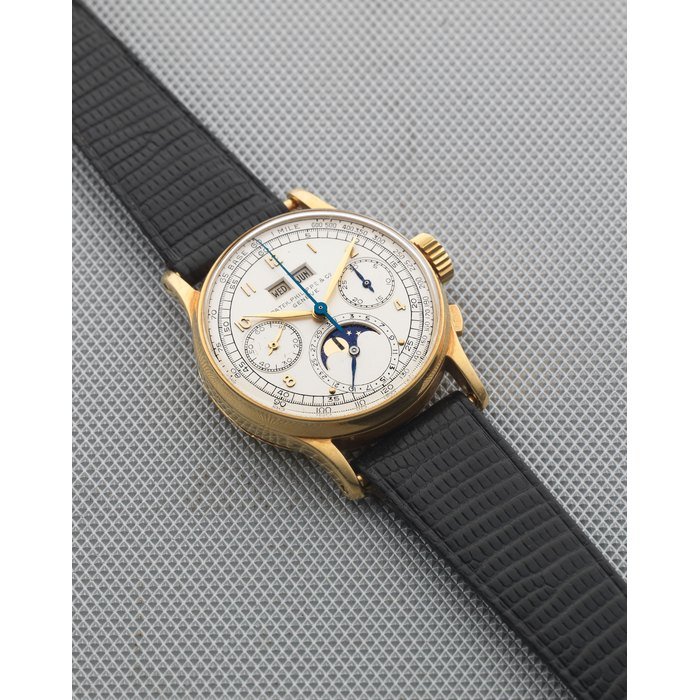 Patek Philippe Patek Philippe. A very rare and fine 18K gold manual wind perpetual calendar chronograph wristwatch with moon phase Ref: 1518, Manufactured 1947, Sold April 6th 1948 · 1518