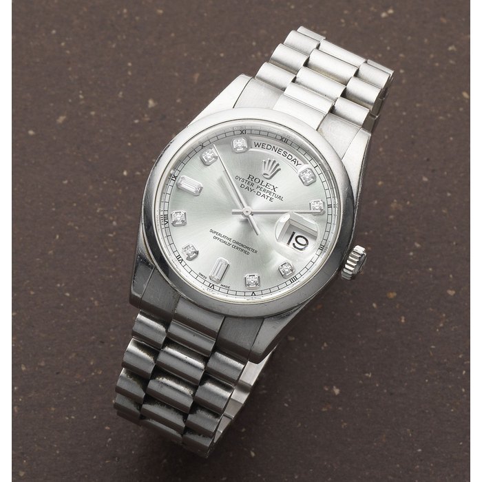Rolex. A platinum and diamond set automatic calendar bracelet watch Day-Date, Ref: 118206, Circa 2000