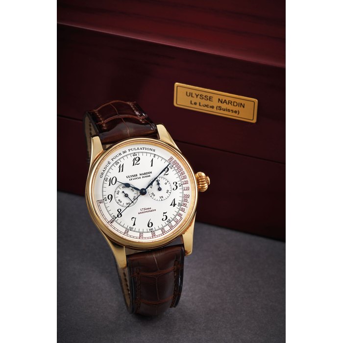 Ulysse Nardin. A Fine Limited Edition Yellow Gold Single Button Chronograph Wristwatch, With certificate, instruction manual and international service booklets