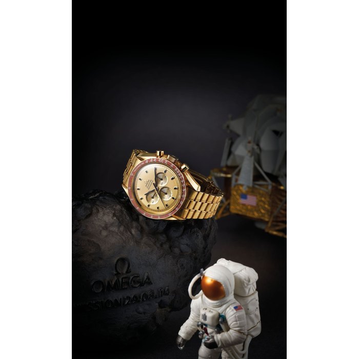 Omega Omega. A Fine Yellow Gold Chronograph Bracelet Watch Commemorating the Apollo XI Moonlanding in 1969, With box and extract, Price & Market Data