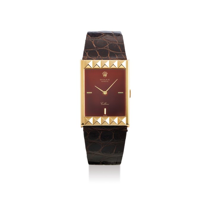 Rolex. A Mid-Size Yellow Gold Rectangular Wristwatch with Mirrored Dial