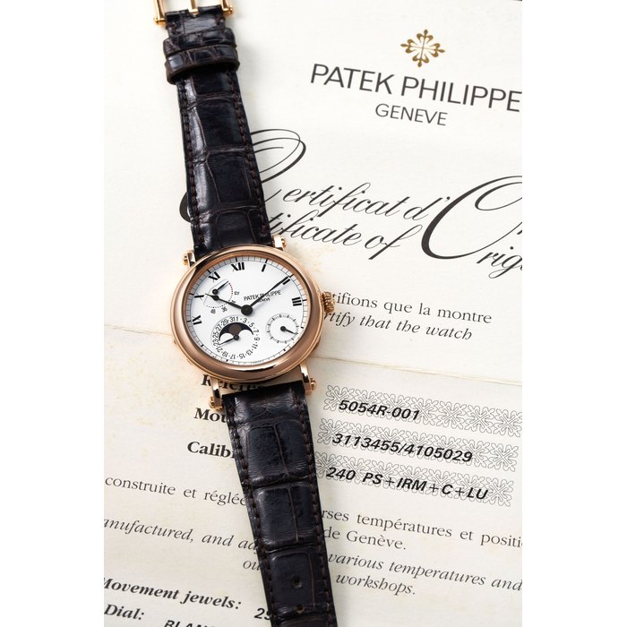 Patek Philippe. A Fine Pink Gold Wristwatch with Power Reserve and Moonphase, With certificate Ref. 5054R