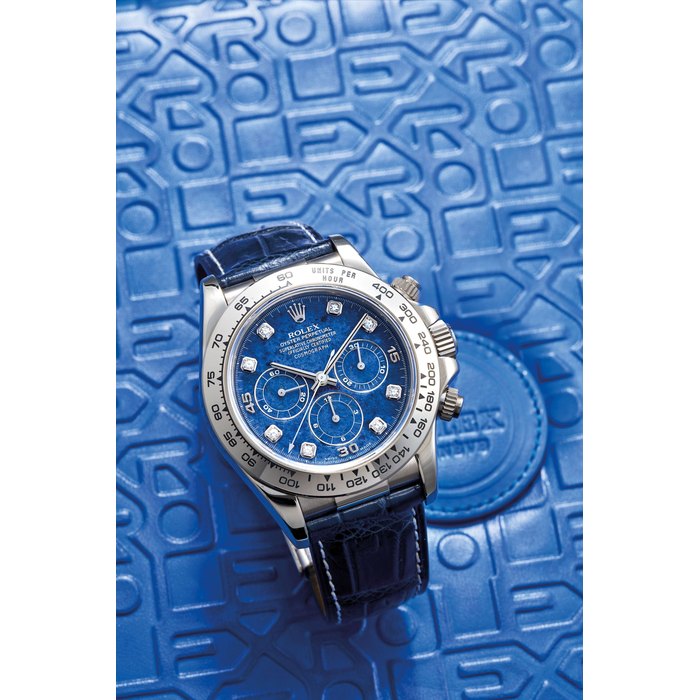 Rolex. A Fine White Gold Chronograph Wristwatch with Sodalite Dial and Diamond Numerals, With box Ref. 116519