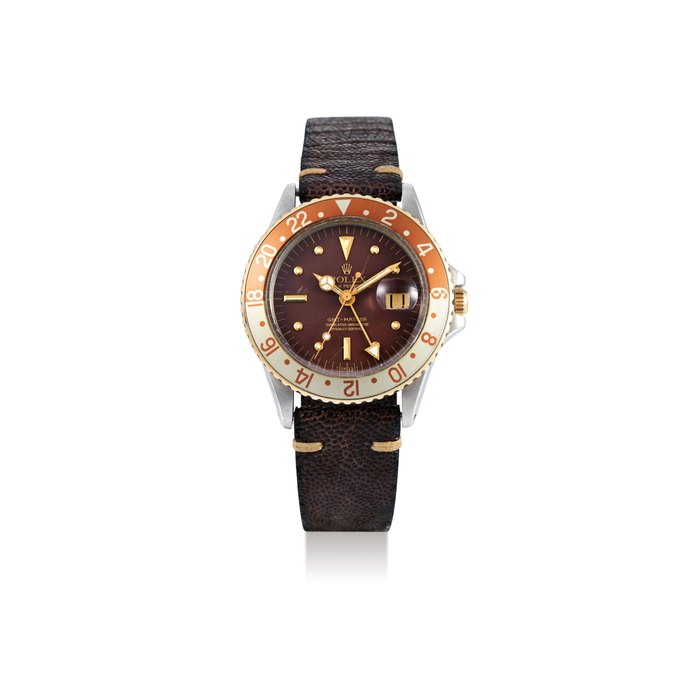 Rolex Rolex. A Stainless Steel And Yellow Gold Wristwatch with Dual Time Zone, 'Root Beer' Bezel and Date, Price & Market Data