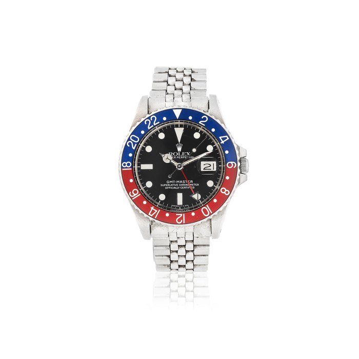 Rolex Rolex. A stainless steel automatic calendar bracelet watch with dual time zone GMT Master 'Pepsi', Ref: 1675, Circa 1975 · 1675