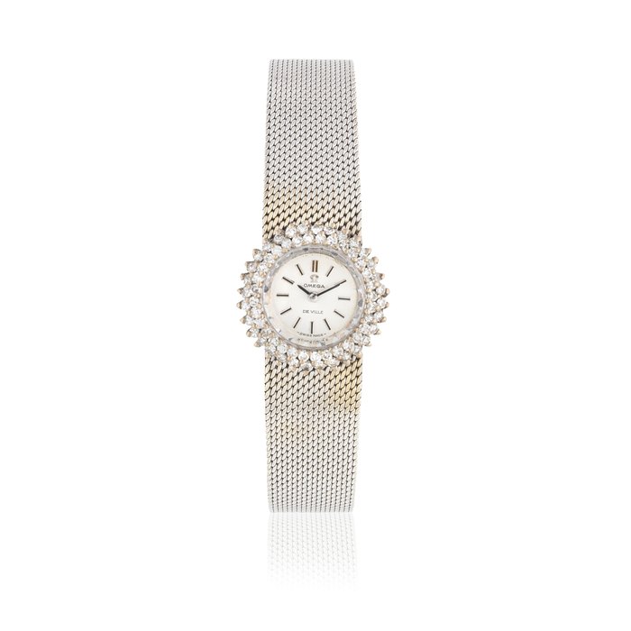 Omega Omega. A lady's 18K white gold and diamond set manual wind bracelet watch De Ville, Circa 1970, Price & Market Data