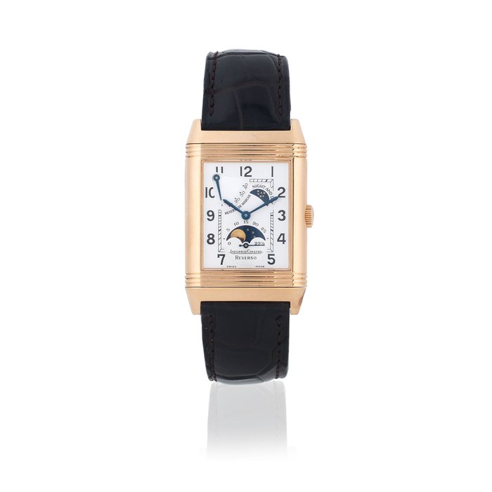 Jaeger-LeCoultre. An 18K rose gold manual wind reversible rectangular wristwatch with day and night indication, moon phase and power reserve Reverso Night & Day Reserve de Marche, Ref: 270.2.63, Sold 19th December 2001