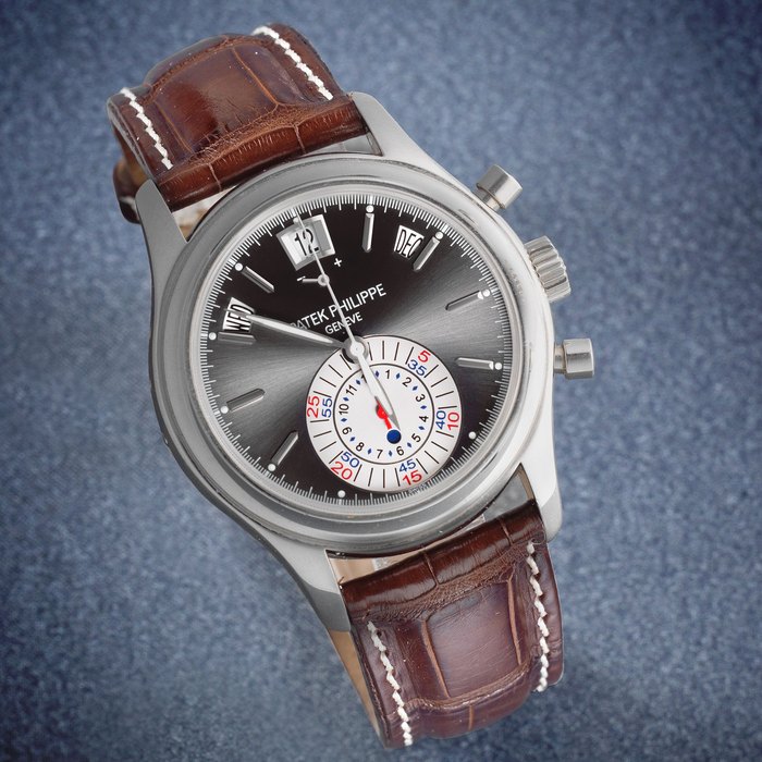 Patek Philippe. A fine platinum automatic annual calendar chronograph wristwatch with power reserve Ref: 5960P-001, Sold 19th May 2006