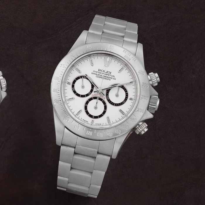 Zenith Rolex. A stainless steel automatic chronograph bracelet watch Cosmograph Daytona 'Zenith Inverted 6', Ref: 16520, Circa 1991, Price & Market Data