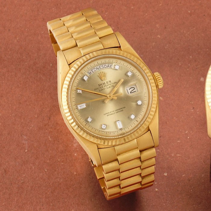 Garrard Rolex. An 18K gold automatic calendar bracelet watch with diamond set dial Day-Date, Ref: 1803, Circa 1974