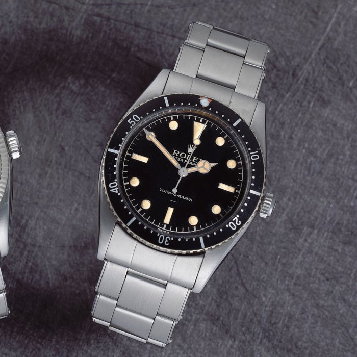 Rolex. A stainless steel automatic bracelet watch with gilt underline dial Turn-o-Graph, Ref: 6202, Circa 1953