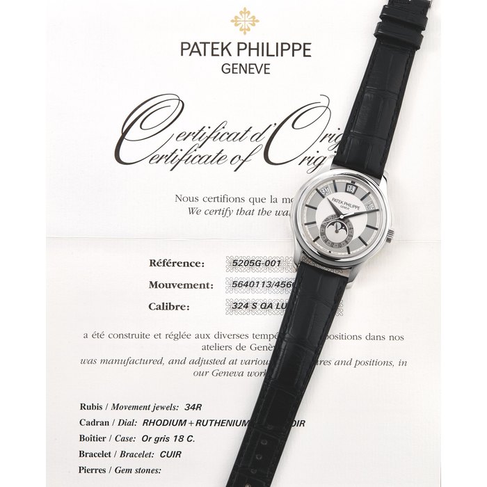 Patek Philippe, A Fine White Gold Annual Calendar, Centre Seconds Automatic Wristwatch with Moonphases Ref. 5205G-001