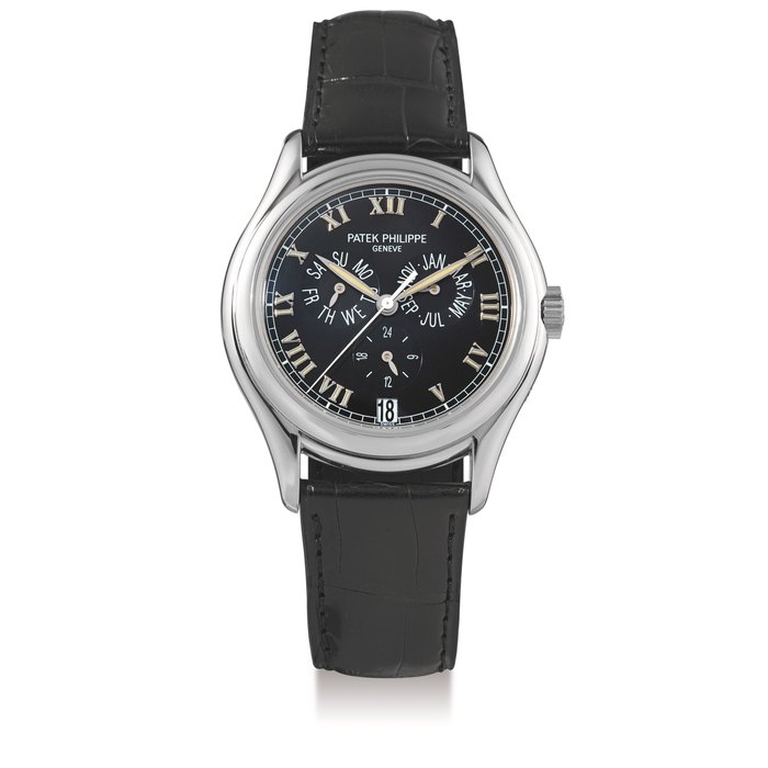 Patek Philippe, A White Gold Automatic Center Seconds Annual Calendar Wristwatch, Ref. 5035G, with certificate