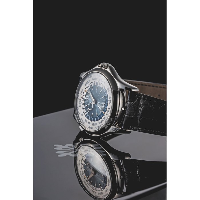 Patek Philippe, A Platinum Automatic Worldtime Wristwatch, Ref. 5130P, Mvt 5542963 with box
