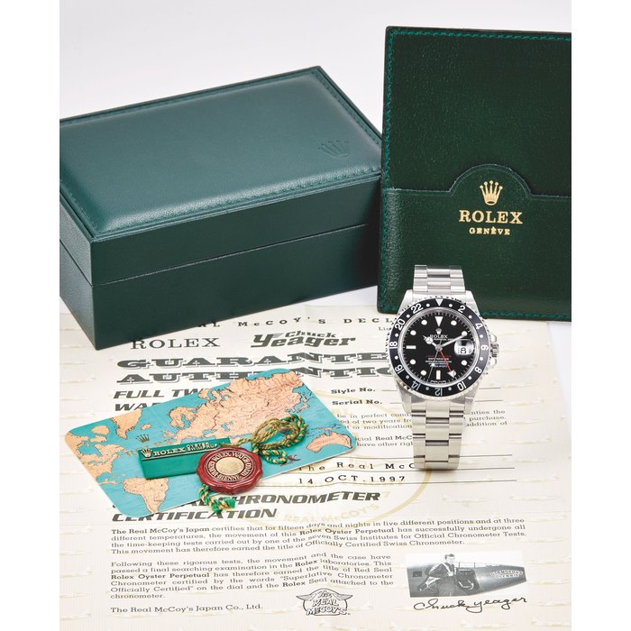 Rolex, A Stainless Steel Limited Edition Automatic Dual Time Wristwatch with Center Seconds, Date and Bracelet, Ref. 16700, "GMT-Master Chuck Yeager, The Real McCoy's", No. 14/50, NO. 14/50, Case No. U443556, Circa 1997 with box, warranty dated 14 Oct 1997 and swing tags