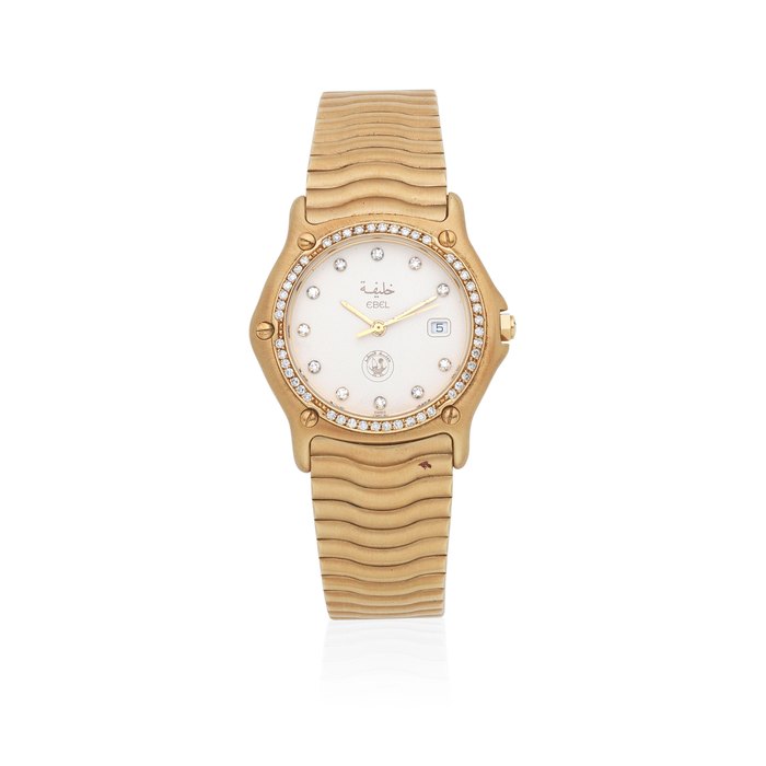 Ebel. A midsize 18K gold and diamond set quartz bracelet watch with middle eastern emblem and matching box Ref: 147, Circa 1980