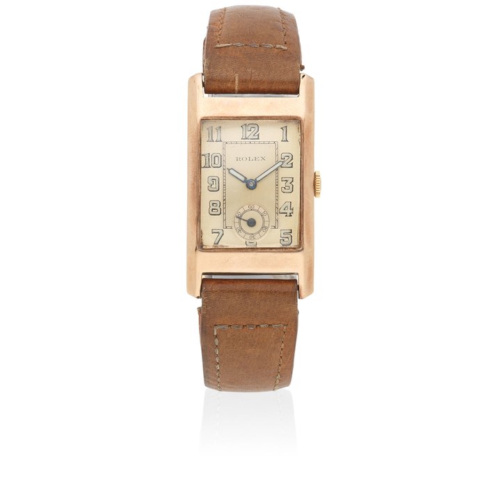 Rolex. A 9K rose gold manual wind rectangular wristwatch Circa 1938
