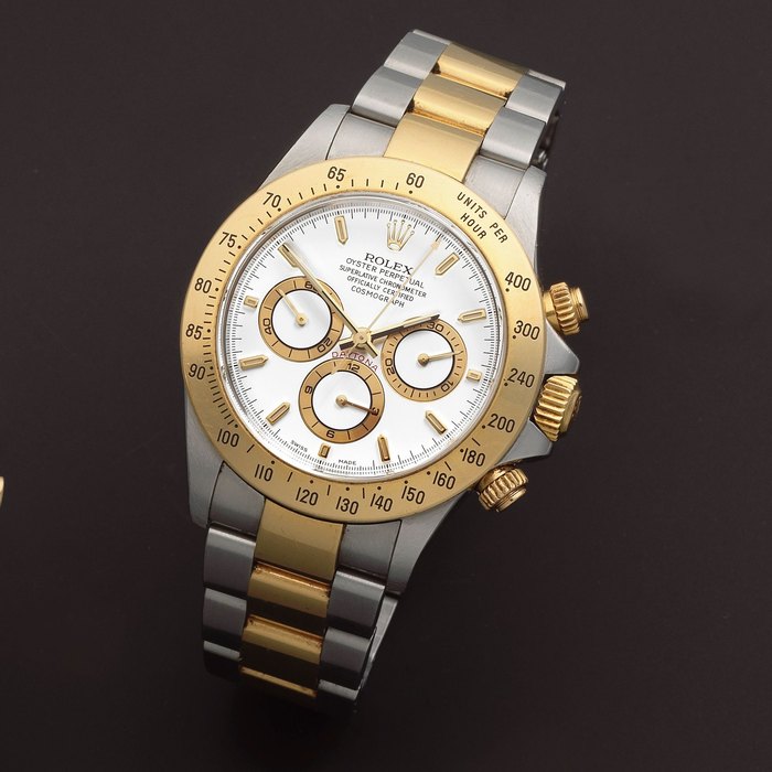 Rolex. A stainless steel and gold automatic chronograph bracelet watch Cosmograph Daytona, Ref: 16523, Circa 1999