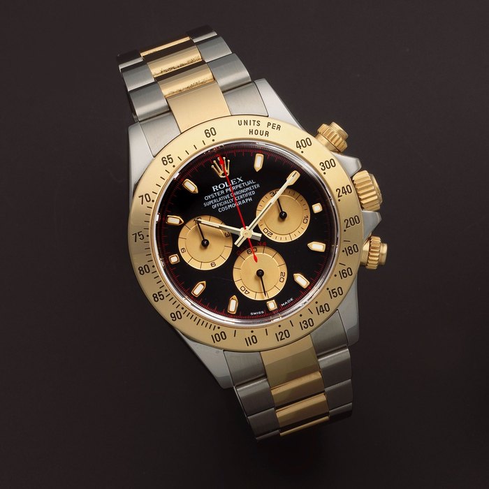 Rolex. A stainless steel and gold automatic chronograph bracelet watch Cosmograph Daytona, Ref: 116523, Sold 5th October 2004