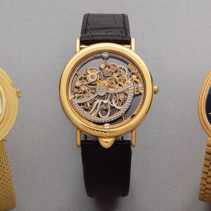 Ulysse Nardin. An unusual 18K gold inverted automatic skeletonised wristwatch Ref: 141 28, Circa 1990