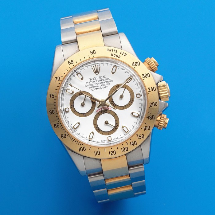 Rolex. A stainless steel and gold automatic chronograph bracelet watch Cosmograph Daytona, Ref: 116523, Sold November 2004