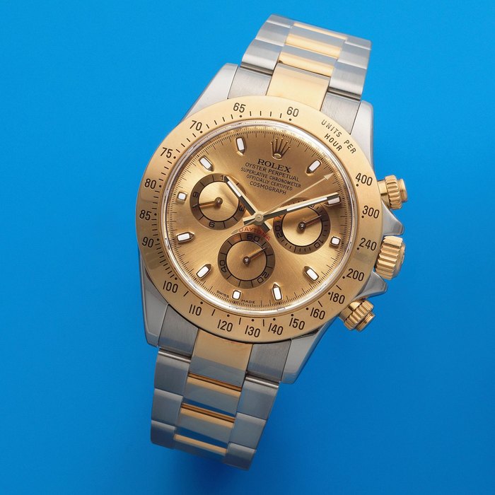 Rolex. A stainless steel and gold automatic calendar chronograph bracelet watch Cosmograph Daytona, Ref: 116523, Circa 2007