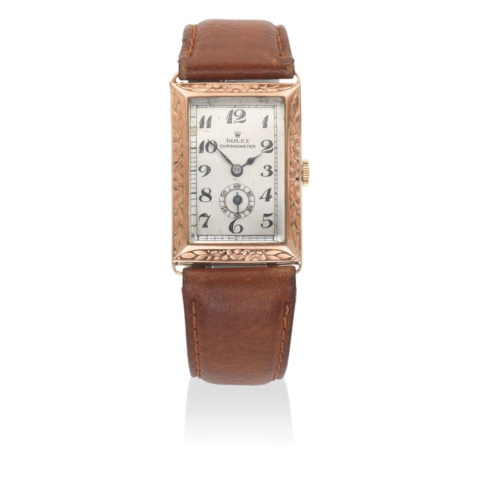 Rolex. A 9K rose gold manual wind rectangular wristwatch Ref: 3025, Sold June 1959