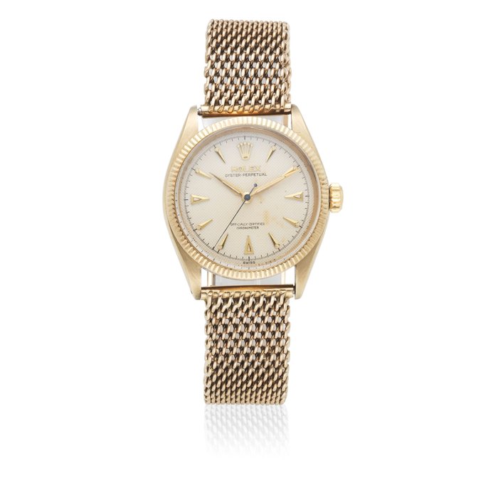 Rolex. A 9K gold automatic bracelet watch Oyster Perpetual, Ref: 6285 1, Circa 1956