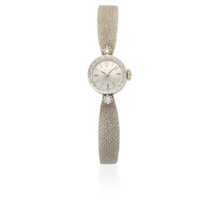Rolex Rolex. A lady's 14K white gold and diamond set manual wind cocktail bracelet watch Circa 1960, Price & Market Data