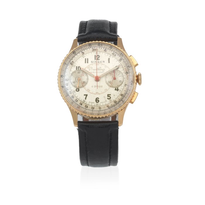 Breitling. An 18K gold manual wind chronograph wristwatch Retailed by Singer Chronomat, Ref: 769, Circa 1947