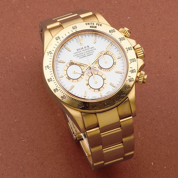 Rolex Rolex. An 18K gold automatic chronograph bracelet watch Cosmograph Daytona, Ref: 16528, Circa 1996 · 16528