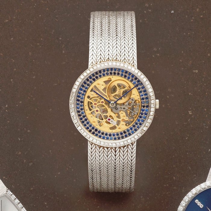 Audemars Piguet. An 18K white gold, diamond and sapphire set skeletonised manual wind bracelet watch Circa 1980