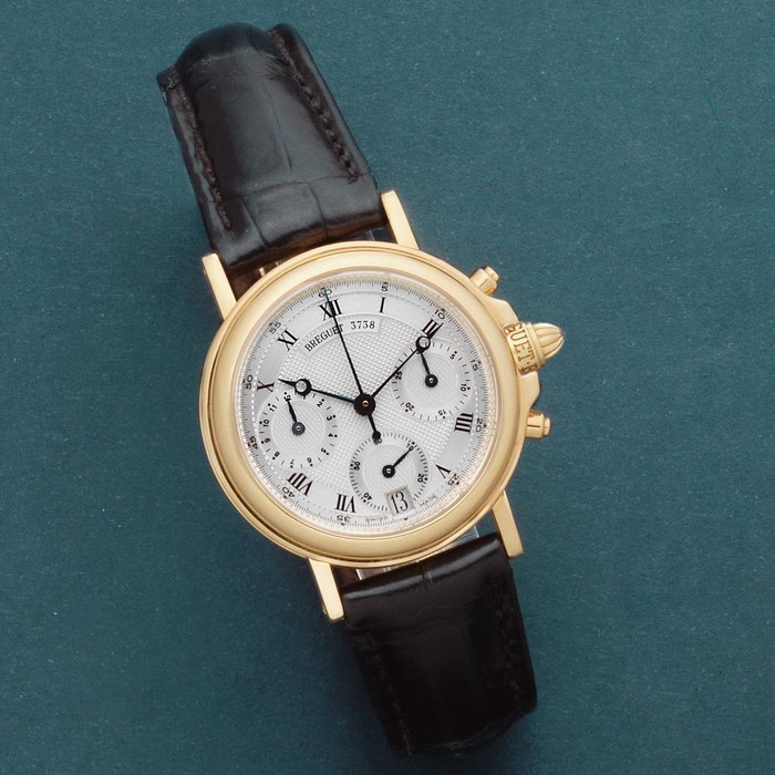 Breguet Breguet. An 18K gold automatic calendar chronograph wristwatch Marine, Ref: 4460BA, Circa 1995, Price & Market Data